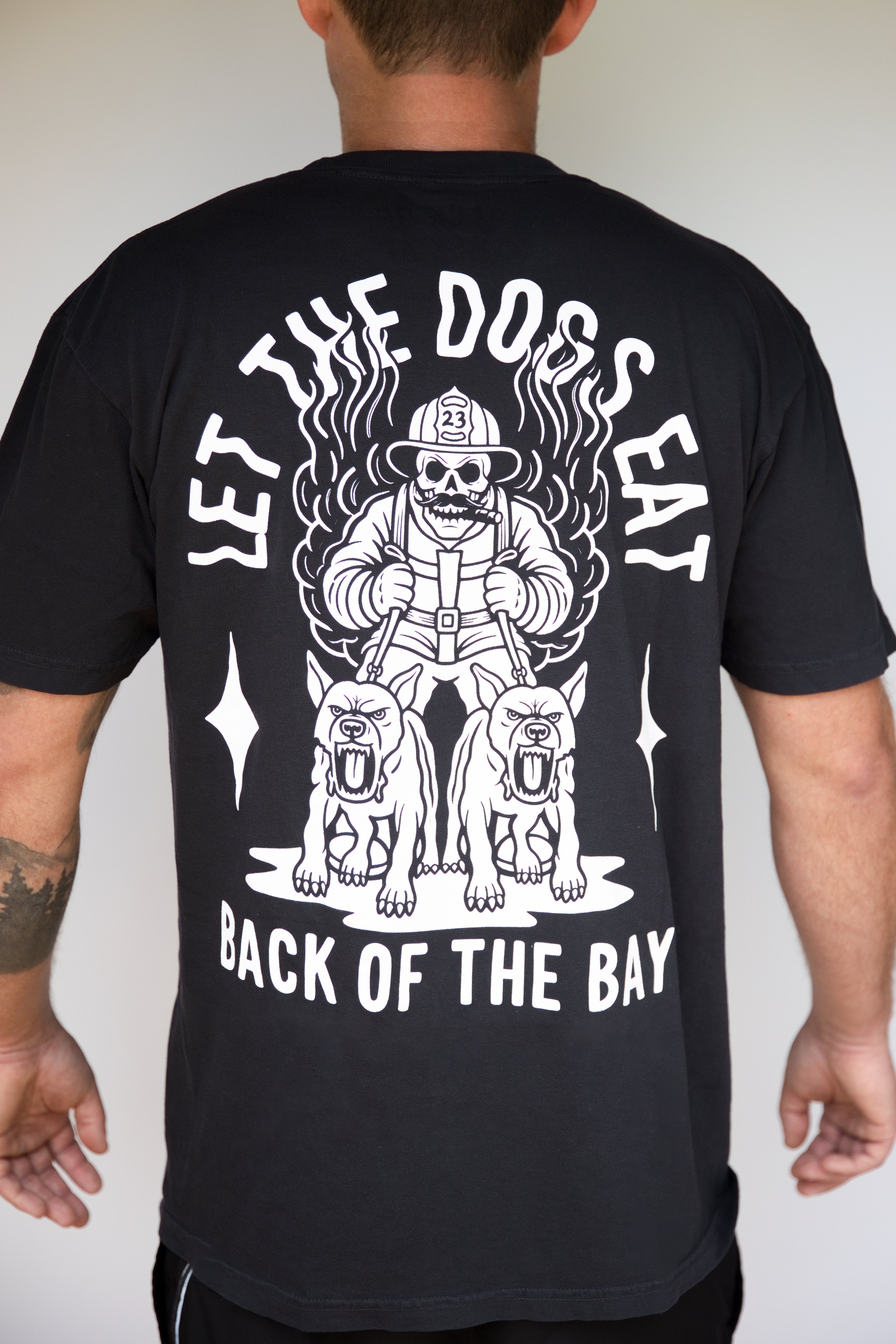 Let the Dogs Eat Tee