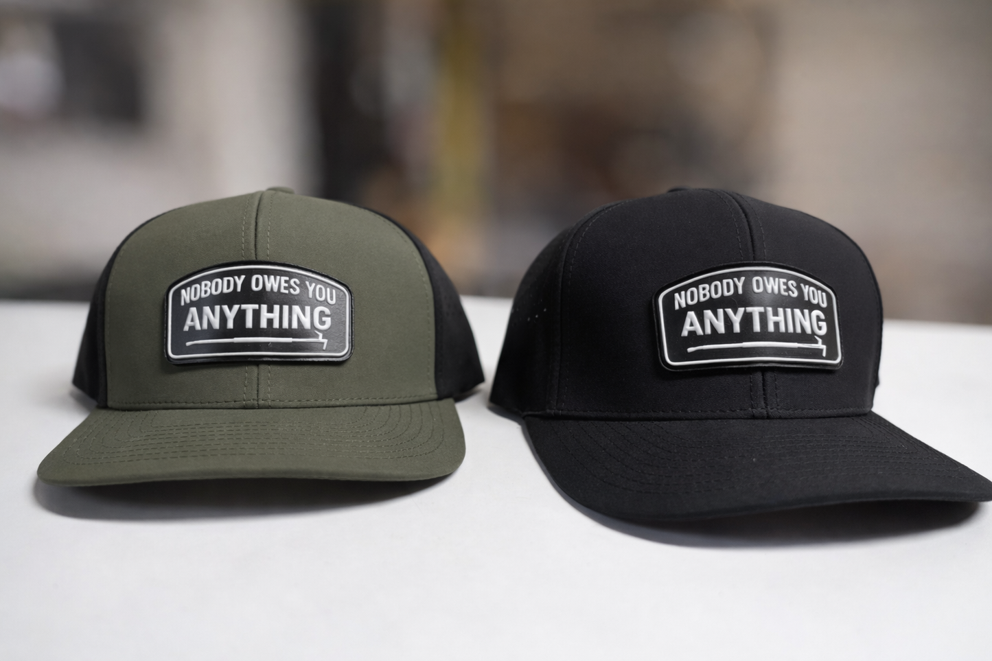 Nobody Owes You Anything Hats